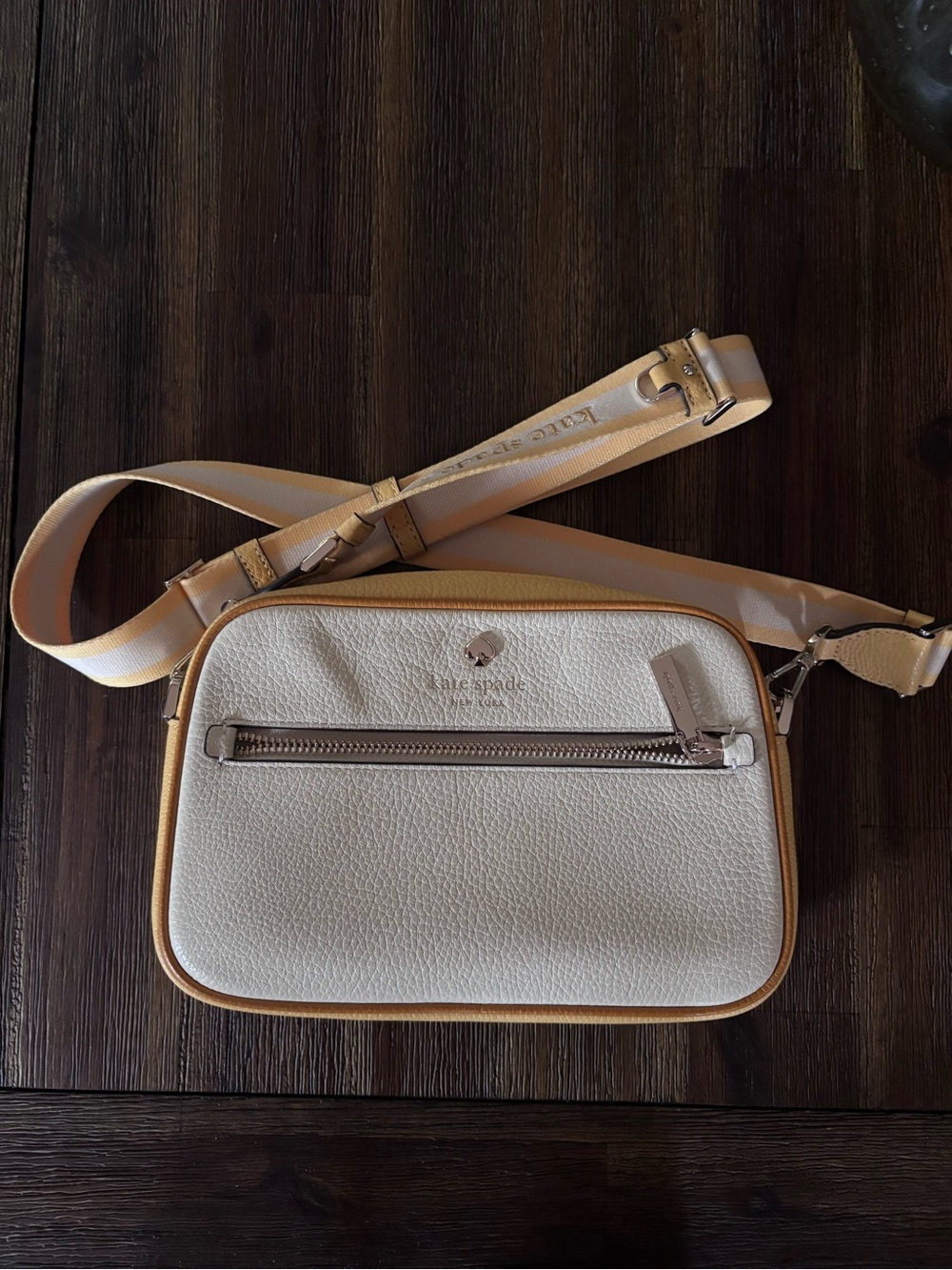 kate spade Cream Crossbody with Yellow Trim and Adjustable Strap. Coin purse